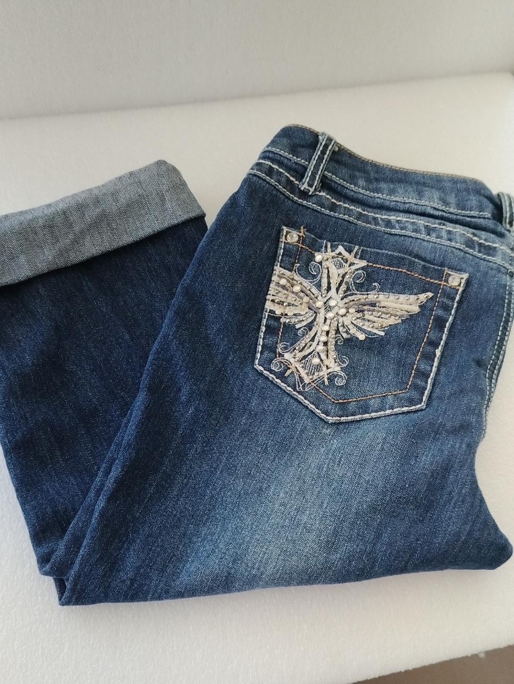 Women's Earl Jean embellished jeans featuring rhinestones on the back.